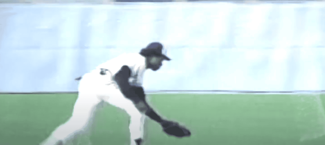 Tony Fernandez in action, highlighting his impact as a shortstop in the '90s.